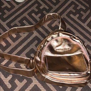 gold backpack purse